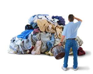 man-with-huge-pile-of-laundry