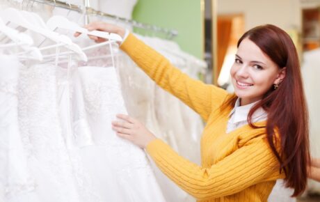 Woman holing a wedding dress